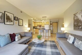 The Living Room features gleaming Hardwood Floors...