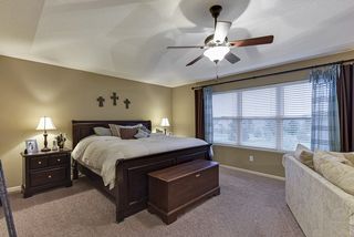 Master bedroom has no shared walls with other bedrooms and views of the back yard