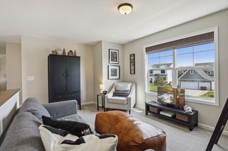 The huge window at the loft allows for natural light and 
perhaps watching the neighborhood.