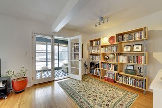The Front 3-Season Sunroom features Large French Doors...