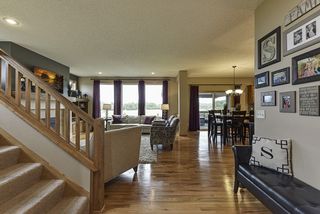 Hardwood floors, solid wood railings, wide floorplan