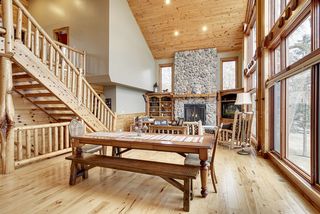 Views of the loft area to your left as well as the family eating area and Family Room space in the background.