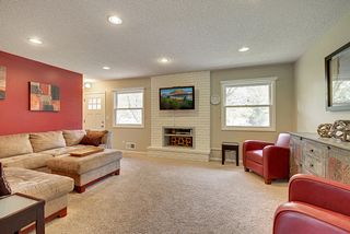 Beautiful living space with a custom shelf in the fireplace. Easily remove to use wood burning fireplace