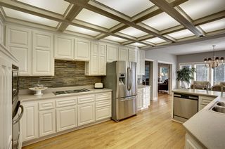 The gourmet Kitchen includes newer SS appliances and slate backsplash!