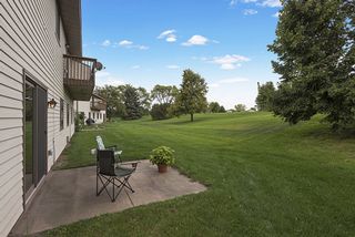 Relax with a good book, or with friends and family on lovely patio open to green space...