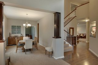 Rich wood floors stretch from the entry and wrap through to the "morning room" in the back of the home