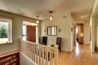 Generous hallways spin off entrance to mudroom, kitchen, great room and bedrooms