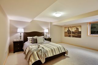 One of two lower level bedrooms with egress windows