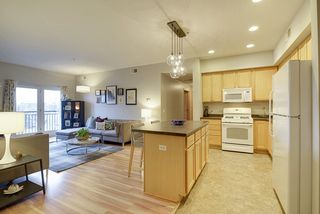 WOW! The Living Room features Hardwood Floors & Private "Juliet Style" Balcony...