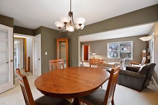 Dining room, open to living room on right, door to kitchen on left
