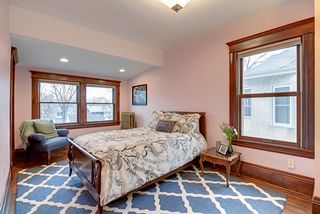 Bedroom #3 features Hardwood Floors and wonderful views of the Back Yard! 