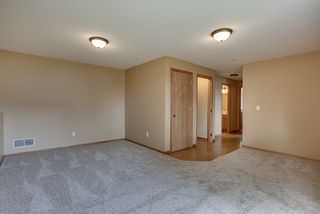 1500 4th St NE - Inviting family room just steps from fourth unfinished level - more room to grow
