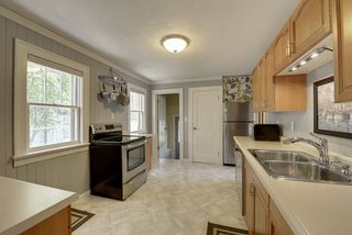 Generous kitchen with stainless appliances and accents.