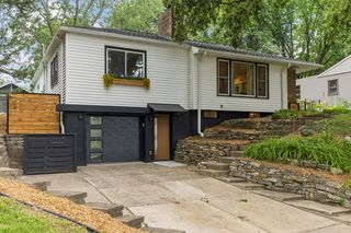 The stylish updates start outside of your new home with a refreshed exterior, new garage and service door and a wonderful blend of mid-century and modern living
