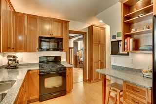 A wall of pantry space, built-in micro and fan, efficient working triangle