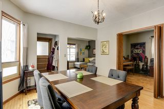 Dining room showing living room and main floor bedroom