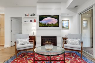 Hidden storage, just behind the TV.