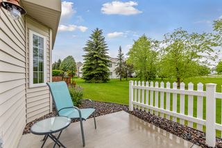 View of patio and green space.