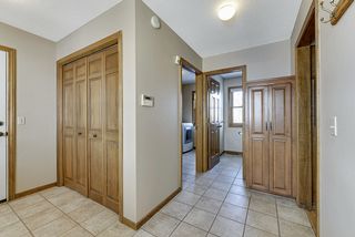 Side mudroom entry closet and garage access - note pantry at center