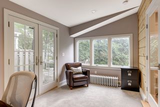 French doors lead to a large patio area over garage