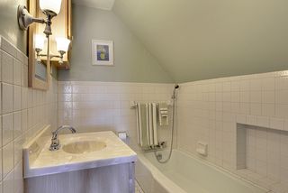 Upper level bath - tub, toilet and sink. 
