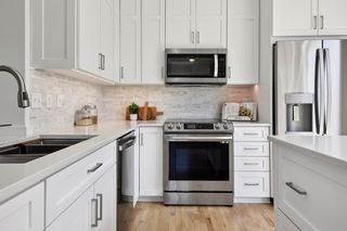 Under-counter lighting on marble backsplash.