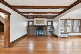 9' wood beamed ceilings and 8" baseboard trim