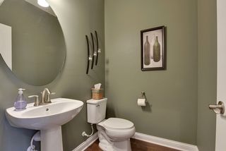 Powder room on main floor off entry hall.