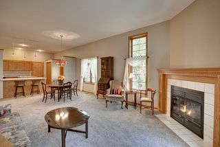 Bar seating off kitchen and adjoining dining space.
