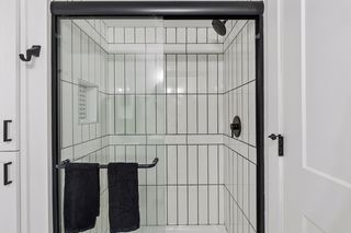 with amazing new shower - nod to the mid-century style with the tile design