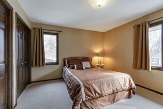Bedroom #2 on the upper level beautiful wood doors throughout 
