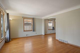 Living Room leads to the Formal Dining Room