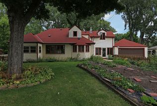 5024 Park Avenue - Enjoy gardens on this spacious double lot - convenience of attached 2-car garage