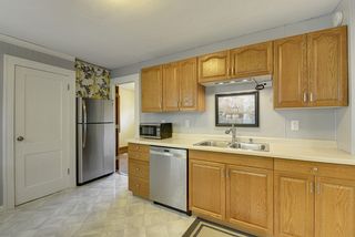 Oversized pantry behind the white door, large refrigerator.