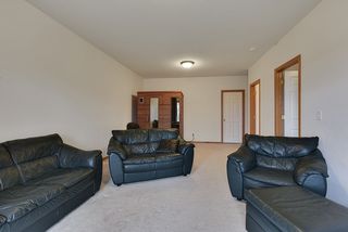 Entertain large groups in spacious family room on lower level...