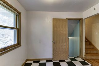 Up to three bedrooms and bath - down to office, second bath, and garage...