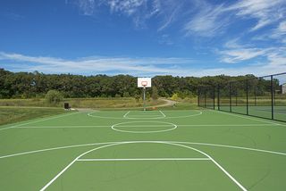 Neighborhood basketball and tennis courts