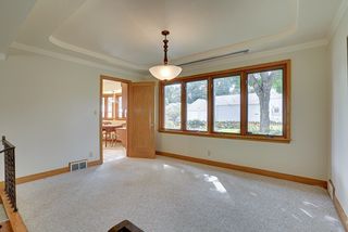 5024 Park Avenue - Enjoy entertaining guests in this inviting dining room with views of gardens
