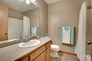 Upper level main bath with updated Silestone counters and chrome accents.