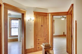 The 2nd Floor Landing is loaded with Natural Woodwork! 