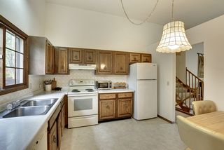 Original kitchen with plenty of space to eat in - tons of opportunity to make this space uniquely yours!