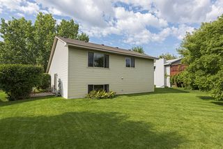 Another view of the back of the home with patio 