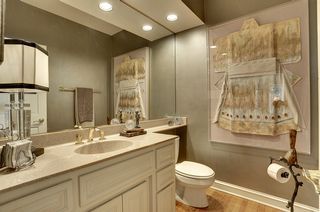 Powder Bathroom is discretely tucked away