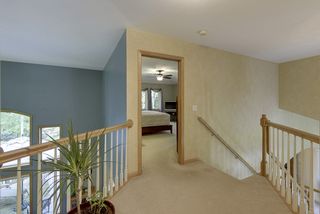 Landing to the master bedroom and balcony looking to entry and family room