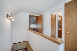 Stairway to upper level-lots of storage here!