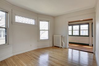 The 2nd Floor Master Bedroom features Hardwood Floors, Sleeping Porch & Original Leaded Glass Window...