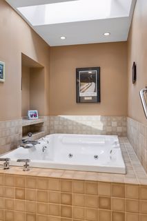 Separate jetted tub and shower