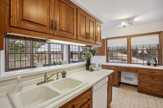Kitchen is equipped with a wonderful buffet/desk area.