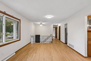 Large front window fills the living room with natural light
