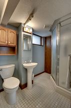 Lower level bath with tile floors